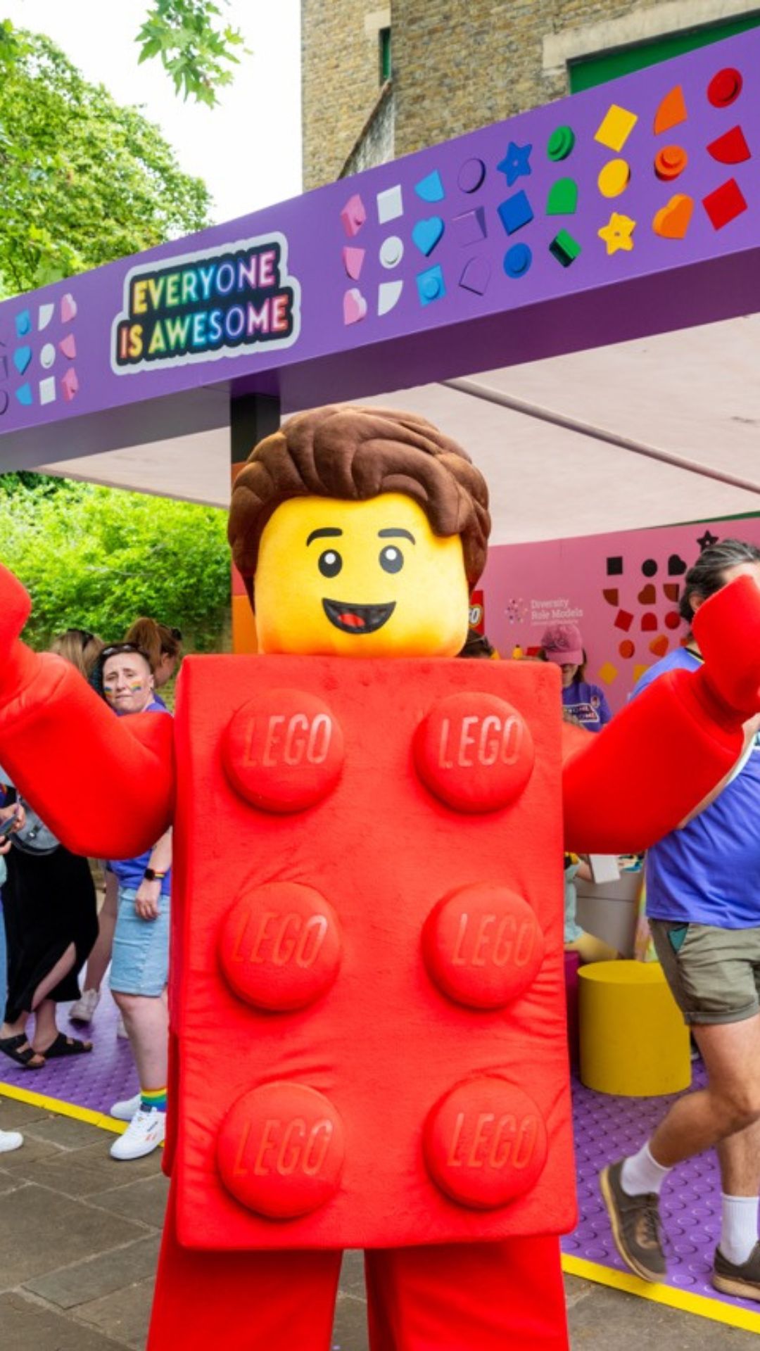 A man in a LEGO suit